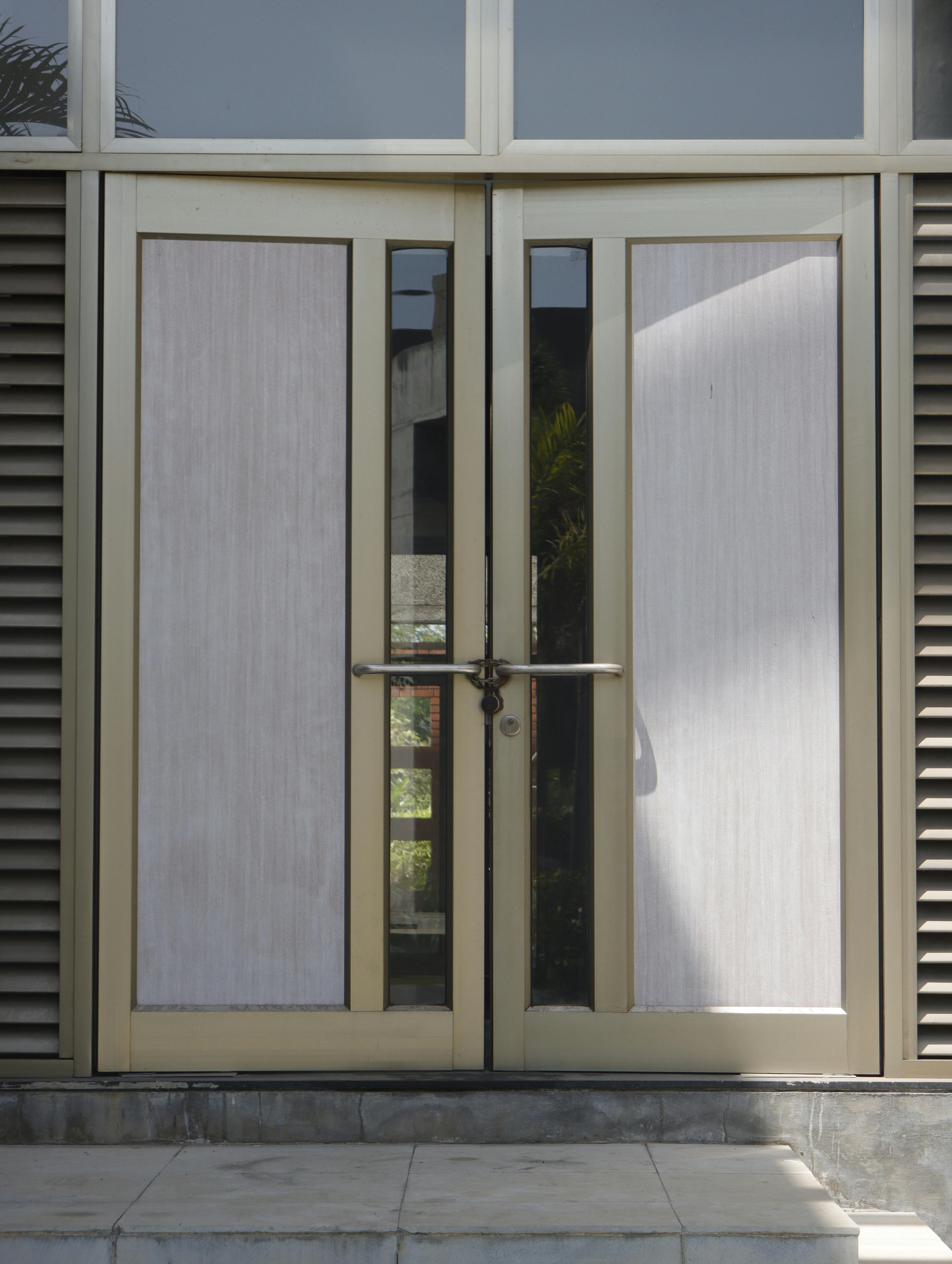 Large glass bifold doors opening to a garden