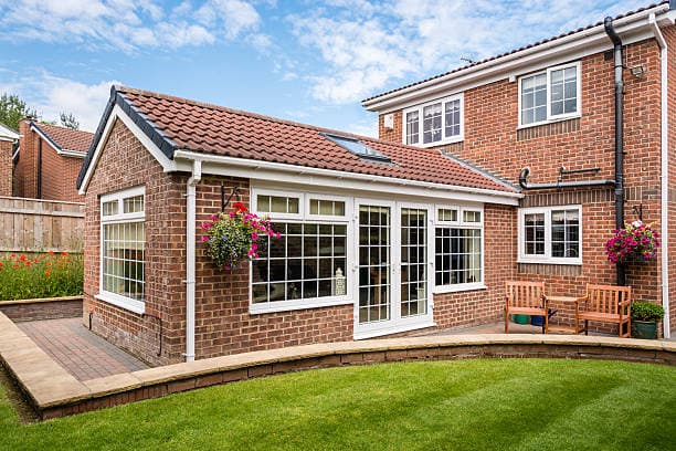 House with a tiled warm roof extension